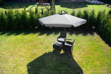 Garden umbrella on the side arm, foldable